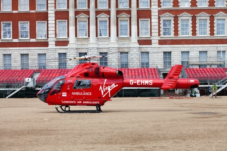 LONDON - JUNE 11: London's Air Ambulance McDonnell Douglas MD 902 Explorer Helicopter landed in Horse Guards Parade London, England on June 11, 2011. London HEMS (Helicopter Emergency Medical Service) is an air ambulance service that responds to seriouslyのeditorial素材