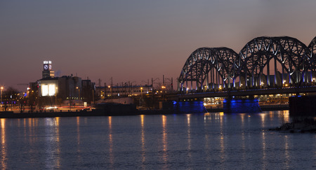 Riga Railway Bridge over river Daugava during dawn timeのeditorial素材