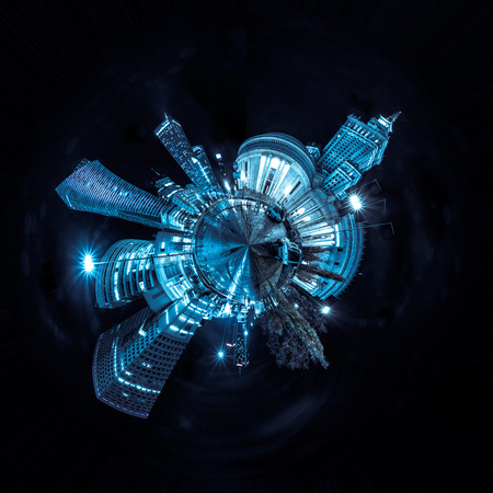 Miniature tiny planet of Night skyline of Warsaw with soviet era Palace of Culture and science and modern skyscrapers. 360 degree montage from 20 imagesの写真素材
