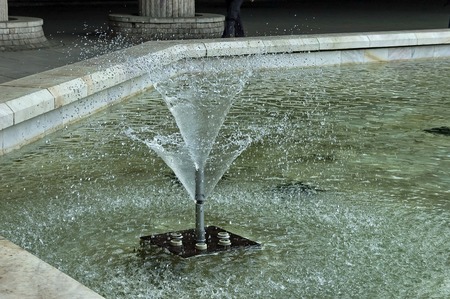 Moment shot of small garden fountain in Sofia cityの写真素材