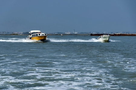 Two boat in venetian lagoon, Italyの写真素材