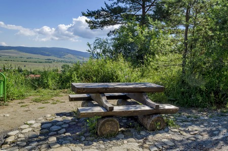 Wooden table and bench by eco trail to Prevails Mali townの写真素材
