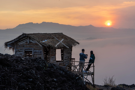 sunrise views in the summer that emerge from the hills in a villageの写真素材