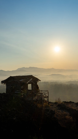 sunrise views in the summer that emerge from the hills in a villageの写真素材