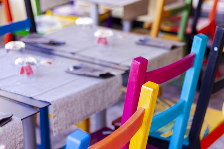 Tables with chairs in a cafeの写真素材