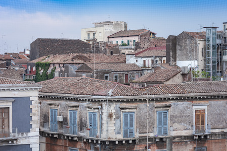 Catania rooftops and cityscape in the background, Sicily, Italyの写真素材