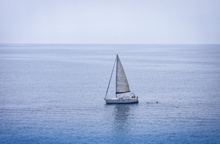 Sailboat near Acitrezza, Catania, Sicily, Italyのeditorial素材