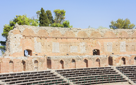 antique amphitheater Teatro Greco in Taormina, Sicilyの写真素材