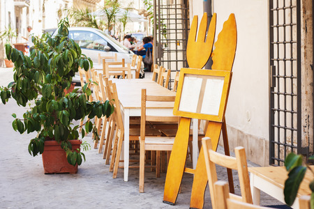 Terrace of outdoor cafe in Syracuse (Siracusa) Sicilyの写真素材