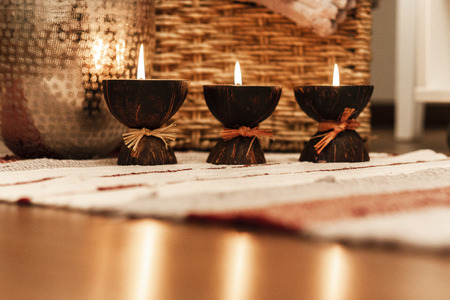 Cozy home interior decor, burning candlesの写真素材
