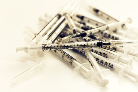 Pile of medical syringes for insulin for diabetesの写真素材
