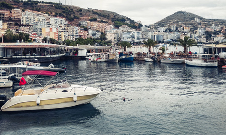 Seafront and boats on the dock of Saranda, Albania, beautiful cityscape