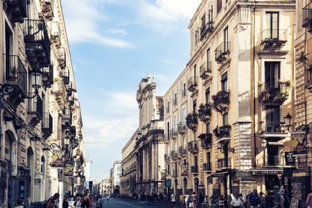 Catania, Sicily â august 08, 2018: people walk on historical street of the city, travel to Italyのeditorial素材