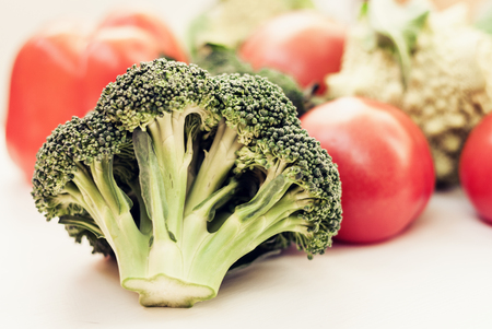 Vegetable variety on wooden white table. Selection of summer and autumn vegetables, space for textの写真素材