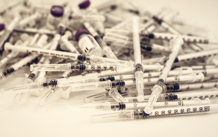 Pile of medical syringes for insulin for diabetesのeditorial素材