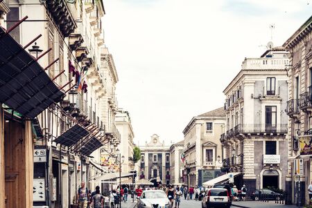 Catania, Sicily â august 08, 2018: people walk on historical street of the city, travel to Italyのeditorial素材