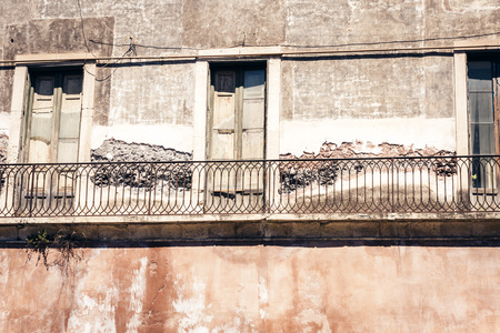 Balcony of old baroque building in Catania, traditional architecture of Sicily, Italyの写真素材