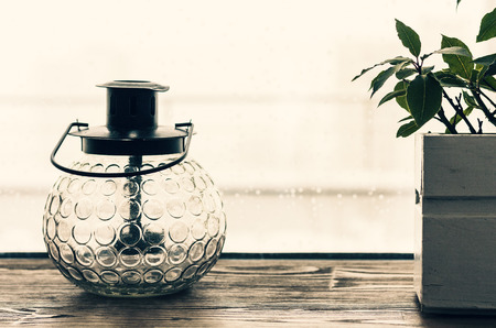 decorative lantern lamp portable on the windowsill
