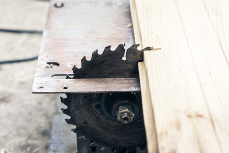 Carpentry machine electronic table saw, sharp cut metal steel silver, retro conceptの写真素材