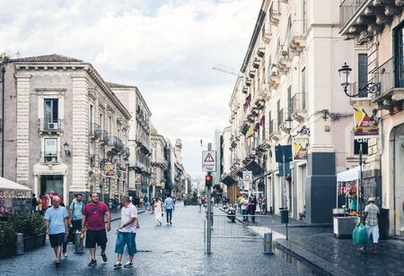 Catania, Sicily â august 15, 2018: people walk on historical street of Catania, Sicily, travel to Italyのeditorial素材