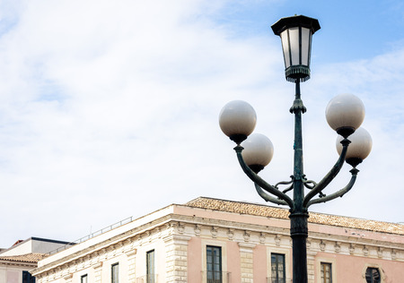 Old street lamppost â vintage light on streets in Catania, Sicily, Italyの写真素材