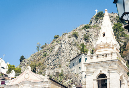 Facade wall of old baroque building in Taormina, traditional architecture of Sicily, Italyの写真素材