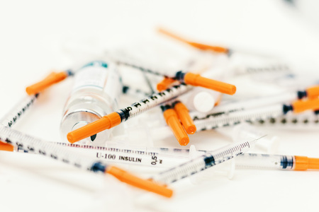 Pile of medical syringes for insulin for diabetesの写真素材