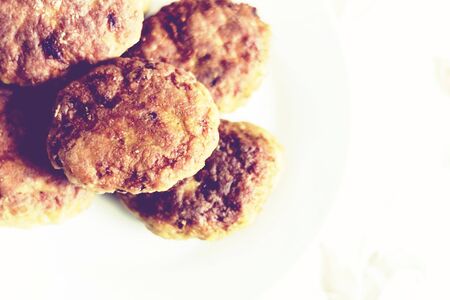 homemade fried minced meat cutlets on white plate, traditional Ukrainian dish