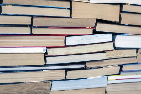 Stack of old book education concept background, many books piles with copy space for text
