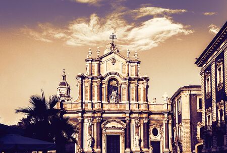 Beautiful cityscape of Italy on sunset, facade of old cathedral in Catania, Sicilyの写真素材
