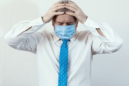 Coronavirus quarantine and Air pollution pm2.5 concept. Old sick man wearing respirator mask for...
