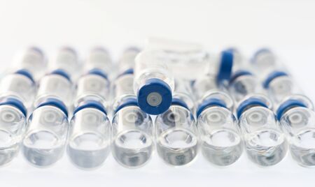 injection ampoules for vaccination on a white background, healthcare coronavirus, cancer, painand treatment, pharmaceutical medicine conceptの写真素材