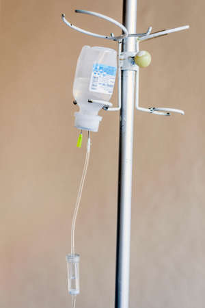 Close-up bottle of medicine on dropper system in the operating room (medical background with an...