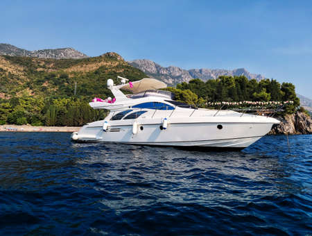 sea trip on a motor boat along the Adriatic coast near Budva, Montenegro, Europeの写真素材