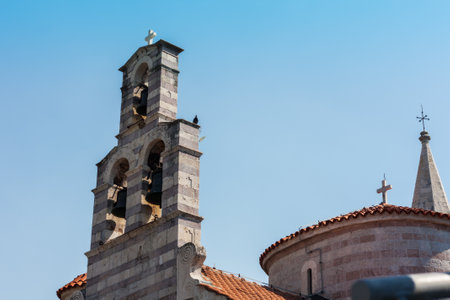 Buildings of Old town Budva, Montenegro: medieval city, ancient walls and red tiled roof, beautiful viewの写真素材