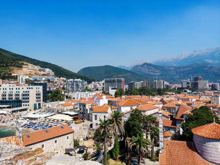 Panoramic cityscape of The Old Town of Budva, Montenegro, beautiful top view of Adriatic Sea and the Balkan Mountainsの写真素材