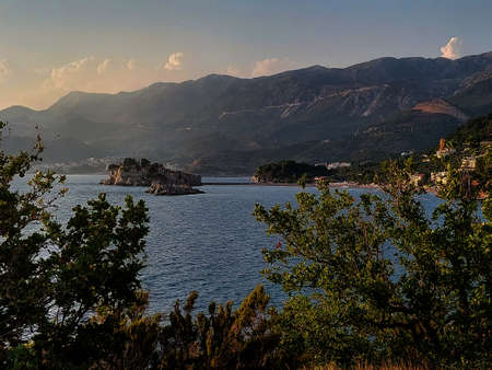 beautiful view of island Sveti-Stefan near Budva in Montenegro, Europe, Adriatic Sea and mountainsの写真素材