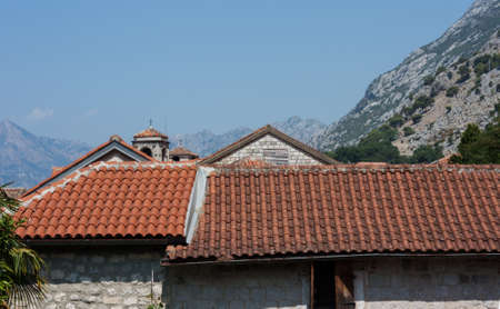 Ancient street, historical building in the old town of Kotor, Montenegro, Europe, Adriatic sea and mountainsの写真素材