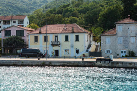 Bay of Kotor, view from the sea to the old town of Herceg Novi in Montenegro, Europe, Adriatic Sea and mountainsの写真素材