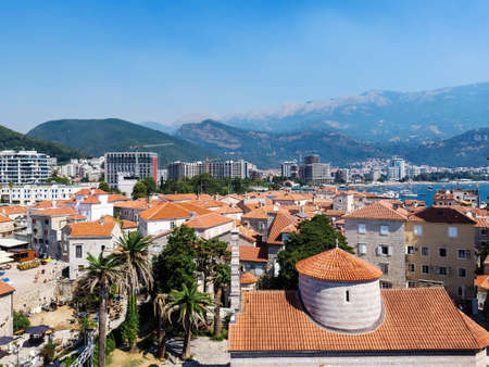 Panoramic cityscape of The Old Town of Budva, Montenegro, beautiful top view of Adriatic Sea and the Balkan Mountainsの写真素材