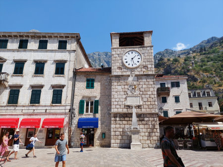 Kotor, Montenegro - August 17 2021: clock tower in the Square of the Arms, in the medieval walled old city, history Center of Kotorのeditorial素材