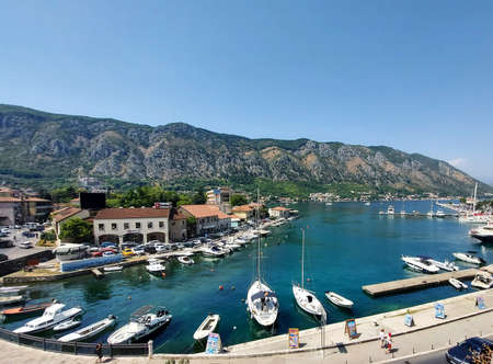 Kotor, Montenegro - August 17 2021: pier with boats and ships in the Bay of Kotor, Adriatic seaのeditorial素材