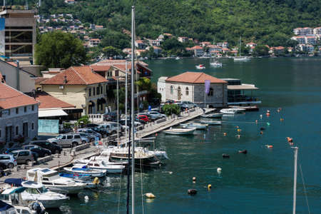 Kotor, Montenegro - August 17 2021: pier with boats and ships in the Bay of Kotor, Adriatic seaのeditorial素材