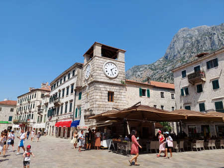 Kotor, Montenegro - August 17 2021: clock tower in the Square of the Arms, in the medieval walled old city, history Center of Kotorのeditorial素材