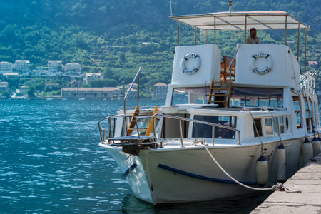 Kotor, Montenegro - August 17 2021: pier with boats and ships in the Bay of Kotor, Adriatic seaのeditorial素材
