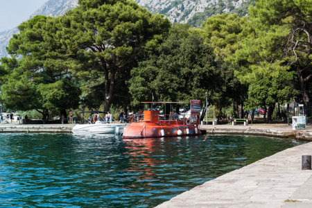 Kotor, Montenegro - August 17 2021: pier with boats and ships in the Bay of Kotor, Adriatic seaのeditorial素材