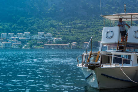 Kotor, Montenegro - August 17 2021: pier with boats and ships in the Bay of Kotor, Adriatic seaのeditorial素材