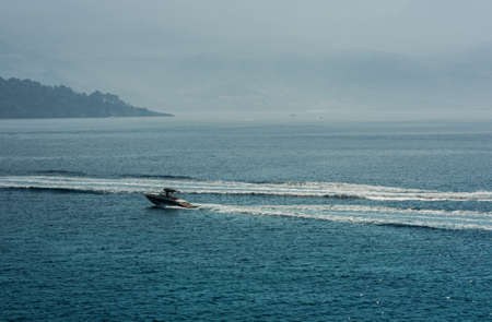 sea trip on a motor boat along the Adriatic coast near Budva, Montenegro, Europeの写真素材