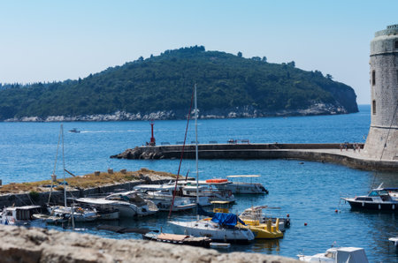 Dubrovnik, Croatia - August 13 2021: view of the port with sail and pleasure boats with background of landmark Dubrovnik old townのeditorial素材