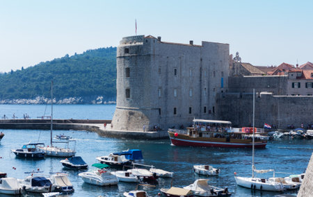 Dubrovnik, Croatia - August 13 2021: view of the port with sail and pleasure boats with background of landmark Dubrovnik old townのeditorial素材